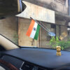 indian flag with a chrome plated staff with a vacuum suction stand for displaying on the cars windshield